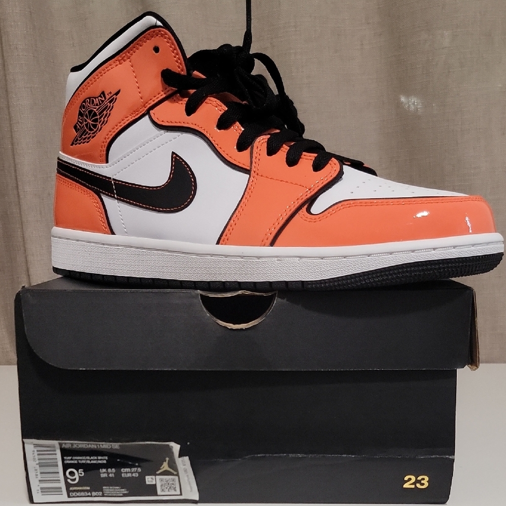 Nike Air Jordan 1 Mid OG in Turf Orange, White, and Black